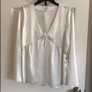 Pearl long sleeve blouse.